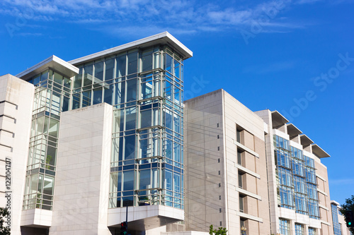 Architectural details of convention center building in Washington DC. The natural light coming through the windows gives a lift to the concrete core structure.