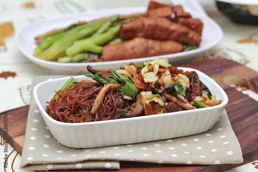 Chinese Vegetable festival food as fried vermicelli with mixed vegetable.Selective focus. Chinese Vegetable festival food as fried vermicelli with mixed vegetable.Selective focus.