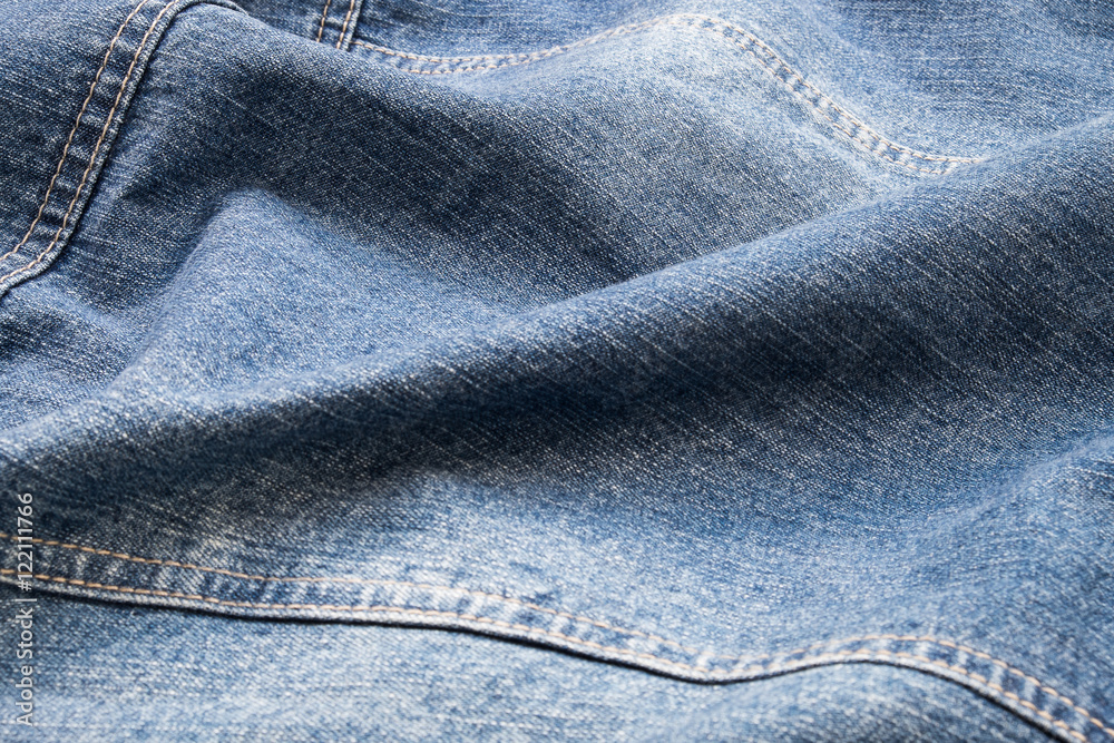 Naklejka premium denim jeans background texture.