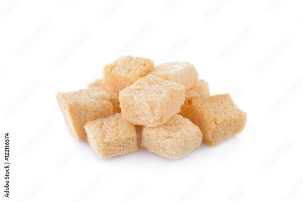 stack of croutons from white bread on white background stack of croutons from white bread on white background