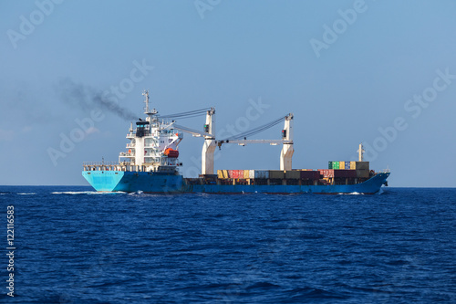 Cargo ship sails on the sea