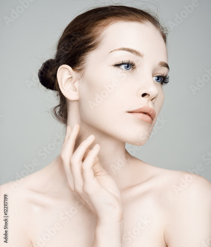 Fashion Beautiful woman face. Mascara Applying.Eyes Make-up. Bea