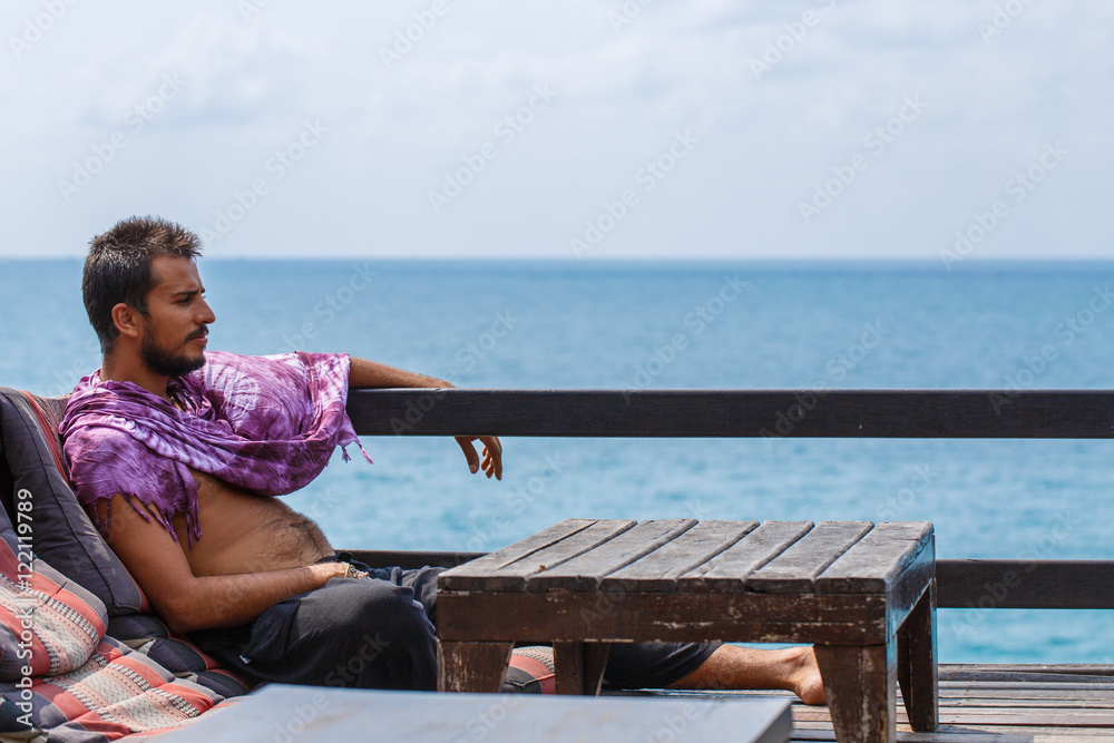 Man resting on the sea
