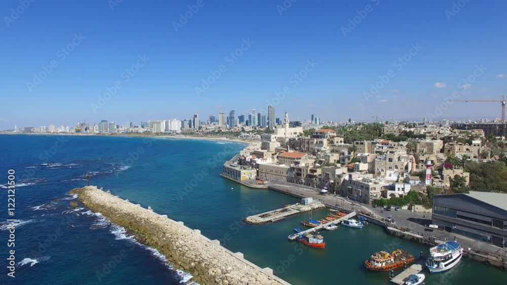 Jaffa's old city and port with Tel Aviv skyline in the background Jaffa's old city and port with Tel Aviv skyline in the background
