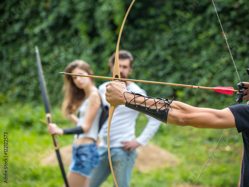 Couple shoots out of the bow