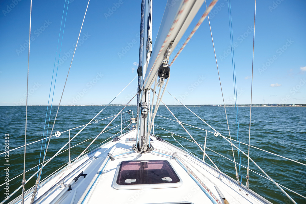close up of sailboat or sailing yacht deck in sea close up of sailboat or sailing yacht deck in sea