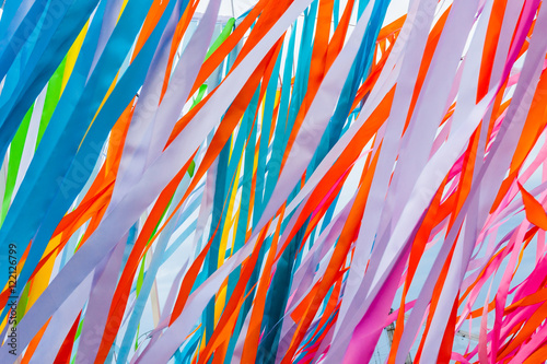 Colorful fabric ribbons wave in the wind
