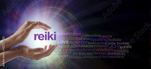 Reiki Vortex Healing Word Cloud - Female hands cupped around the word REIKI with a relevant word cloud on a spiraling bright light vortex background and copy space photo