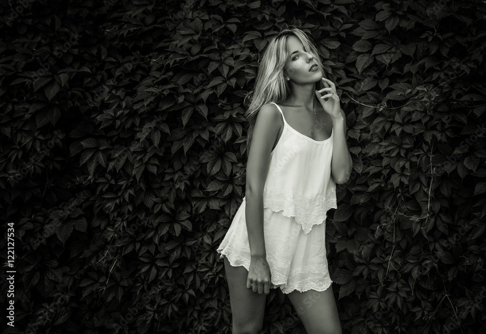 Outdoors portrait of beautiful young woman. Sepia toned. Outdoors portrait of beautiful young woman. Sepia toned.