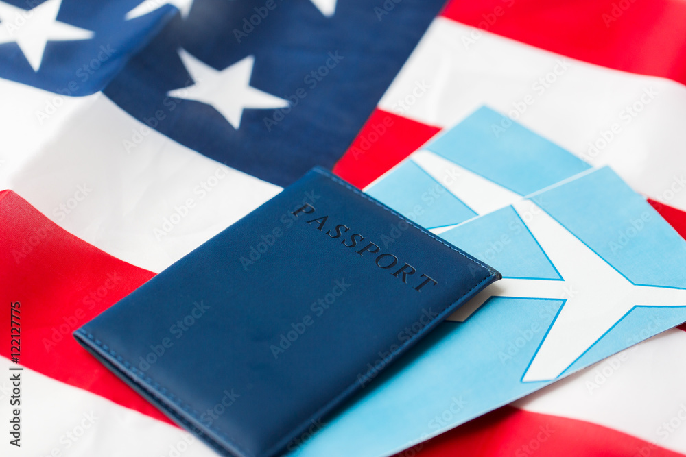 american flag, passport and air tickets