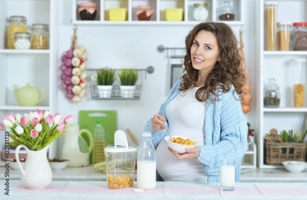 beautiful pregnant woman with  milk