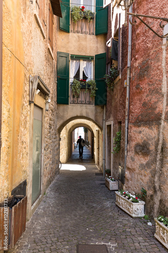 Old street and picturesque houses of Torri del Benaco. Garda Lake  Italy