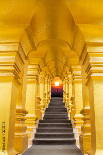 golden arch over the stair and sunrise background