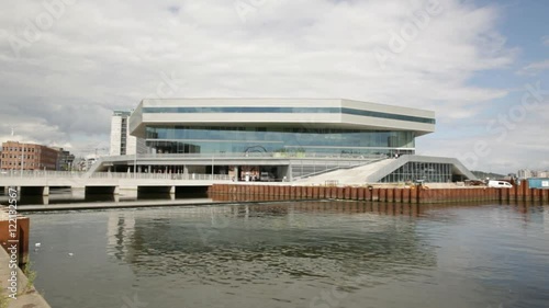 wide shoot pan over dokk1 and harbour from port side.01.08.2016.Location: Dokk1, Aarhus harbour, Denmark.Completed in 2015, the 35,600m² facility is the largest public library in Scandinavia. photo