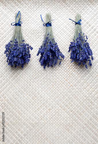 Bunch of Lavender on straw mat.