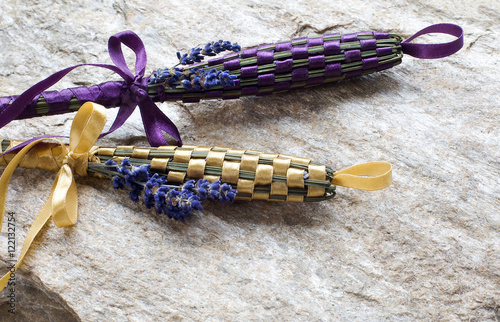 Fragrant wands made from fresh lavender. Rocky background