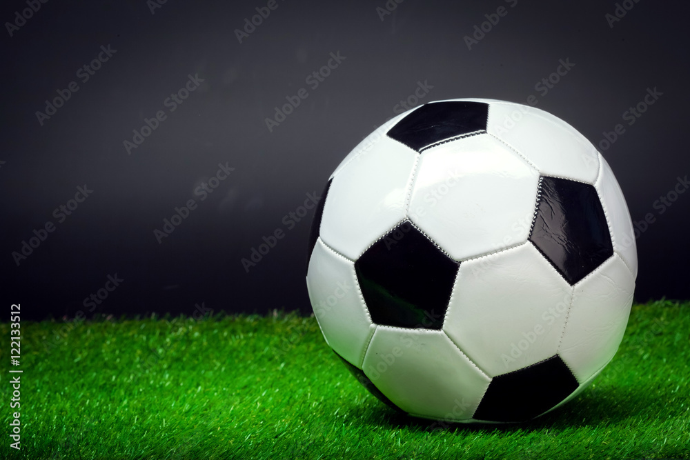 soccer ball on the green field soccer ball on the green field