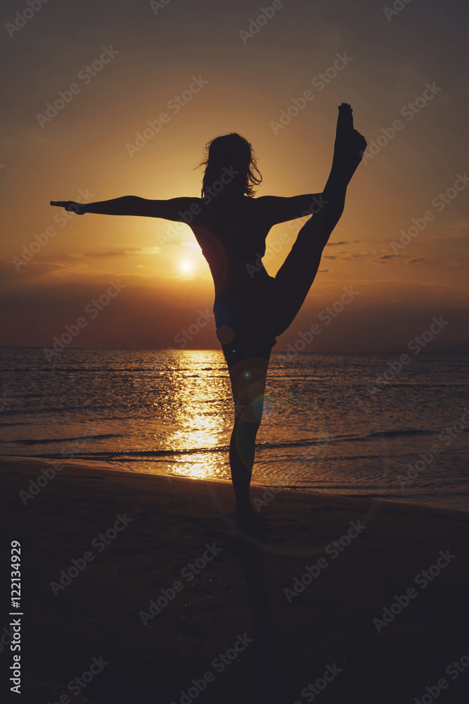 Woman practicing yoga in various poses (asana)