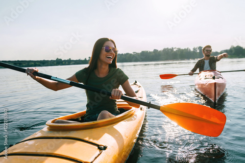 Vászonkép Couple kayaking together.