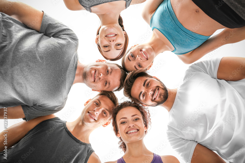 Team work concept. Group of people standing head to head Team work concept. Group of people standing head to head