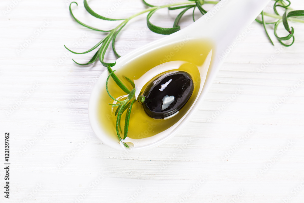 Fototapeta premium Oils on vintage wooden background . healthy food