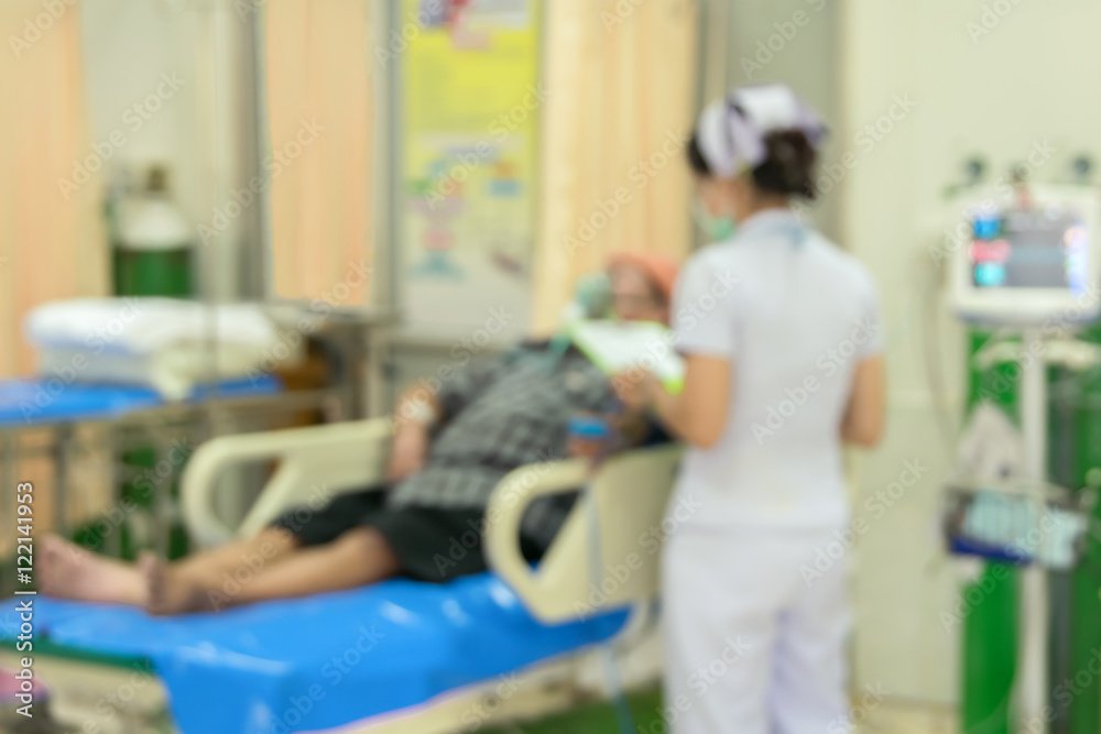 Blurred nurse in emergency room for medicine background concept