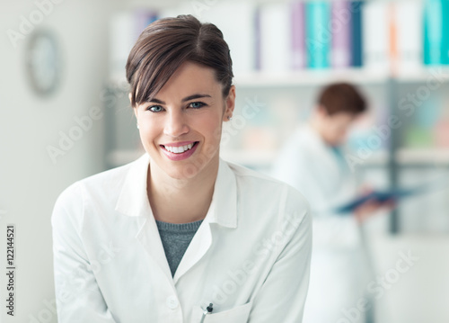 Smiling doctor at the clinic © stokkete