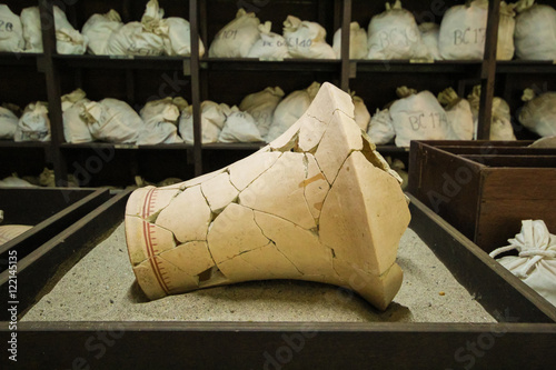 an ancient rough pitcher isolated over a black background