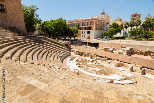 Sunny view of ancient amphitheater Teatro Romano de Malaga,  Malaga, Andalusia province, Spain.
