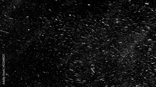 Falling real snowflakes from left to right, shot on black background, matte, wide angle, animation with start and end, isolated, perfect for digital composition