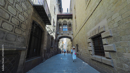 Photography BARCELONA CATALONIA SPAIN - JULY 2016: Smooth camera steady shot along narrow st