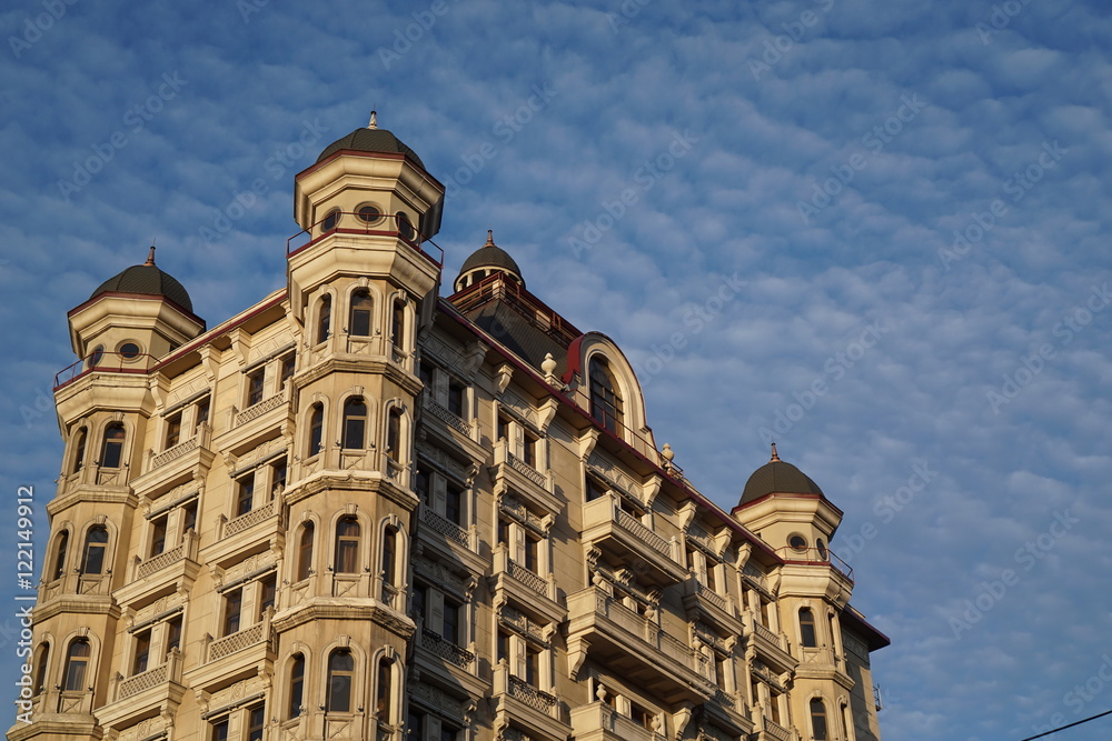 Building and the cloudy sky