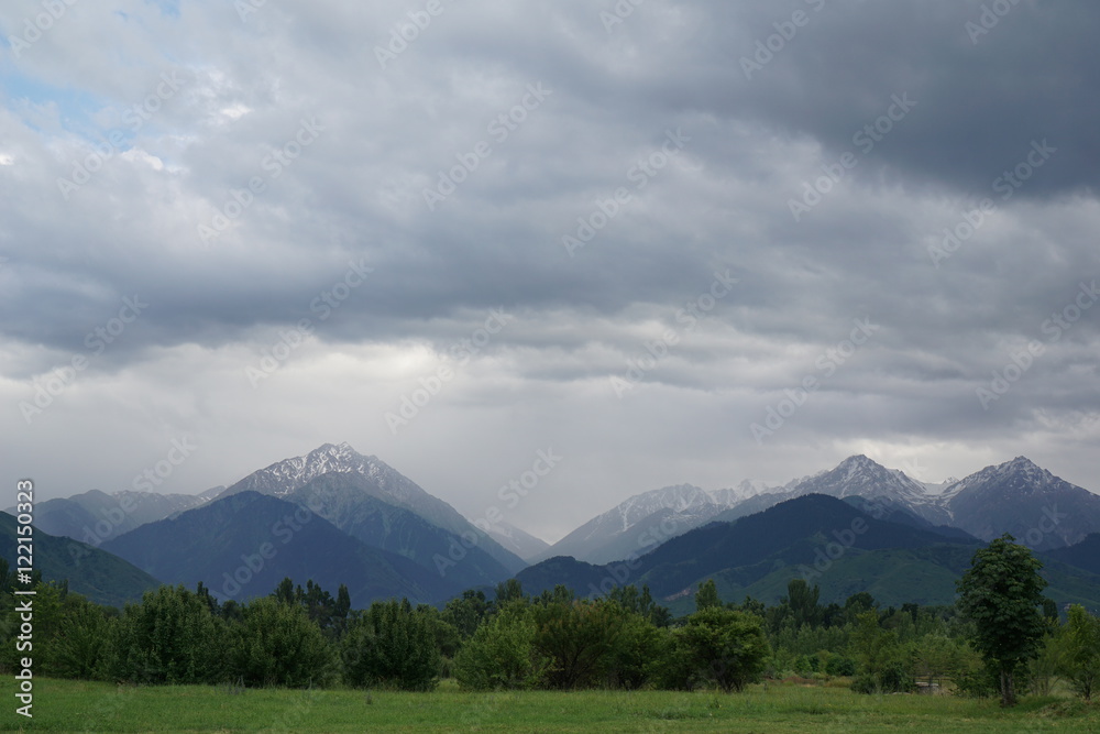Mountains and cloudy sky