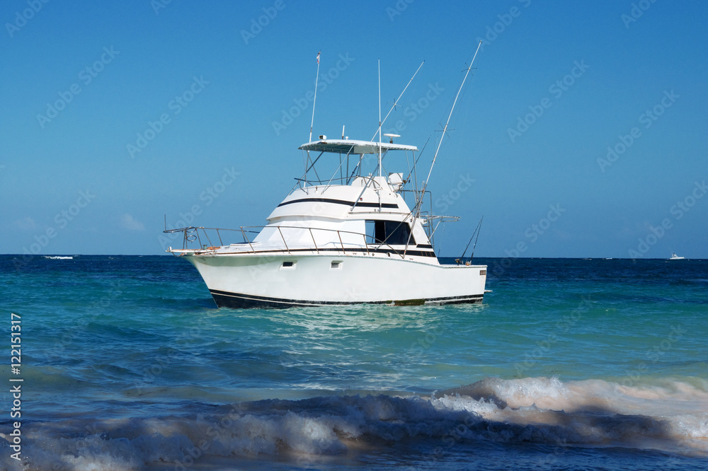 pleasure yacht anchored off the coast of the Dominican Republic. ocean tropical pleasure yacht anchored off the coast of the Dominican Republic. ocean tropical