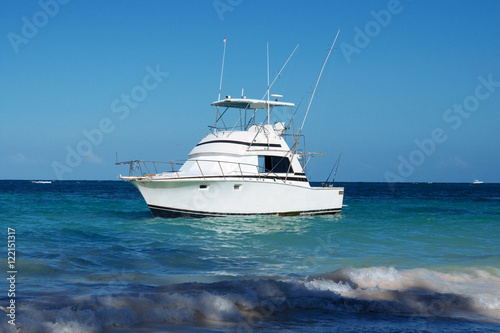 pleasure yacht anchored off the coast of the Dominican Republic. ocean tropical © Евгений Кожевников