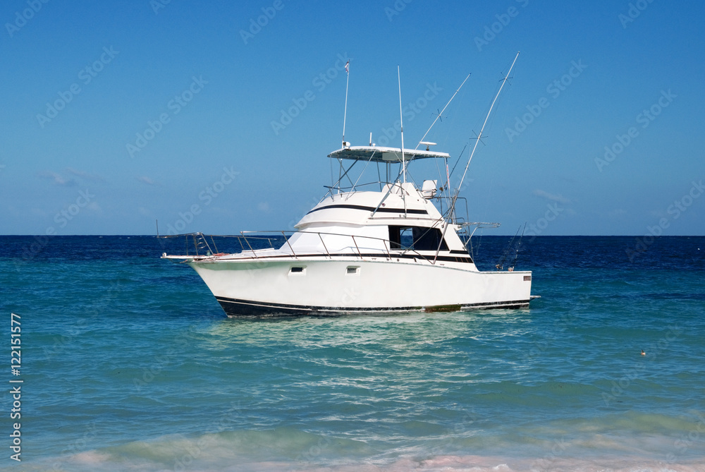 Fototapeta premium pleasure yacht anchored off the coast of the Dominican Republic. ocean tropical