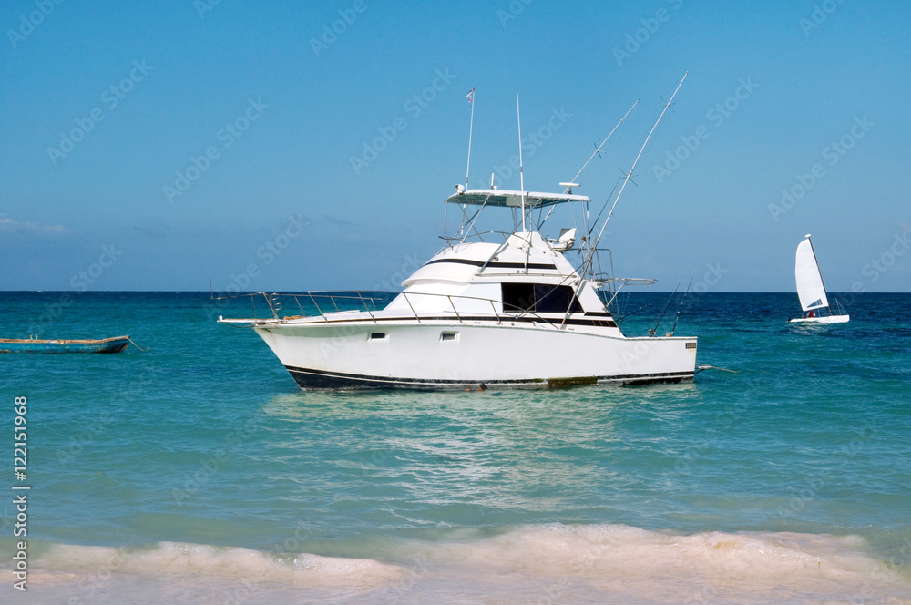 pleasure yacht anchored off the coast of the Dominican Republic. ocean tropical pleasure yacht anchored off the coast of the Dominican Republic. ocean tropical