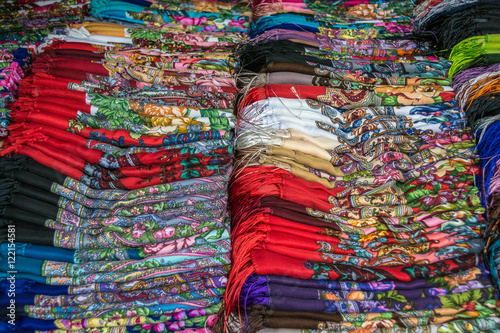 Multi colored fabric. Selective focus © Vastram