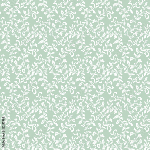 Tender seamless pattern with twisted spiral branches with leaves. The pattern can be used for printing on textiles  wallpaper  packaging