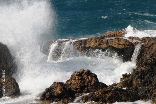 Big waves crashing on rocks in Paros Aegean island