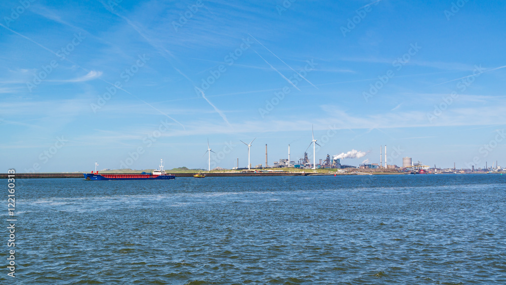 Steel making industry and North Sea Canal in seaport IJmuiden near Amsterdam, Netherlands