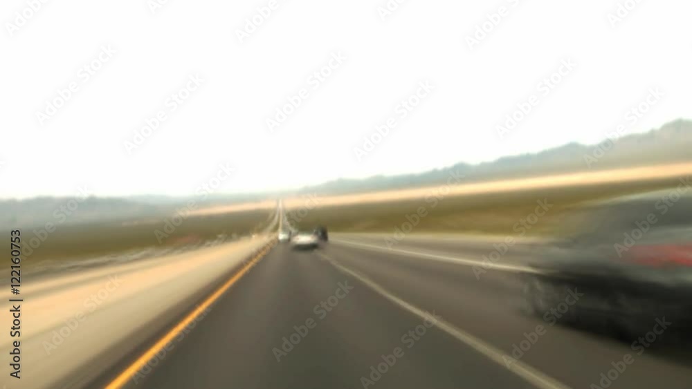 A time lapse speeding down a desert highway. A time lapse speeding down a desert highway.