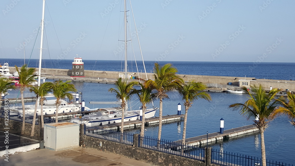 Obraz premium Beautiful coast and harbor of the Canary Island of Lanzarote