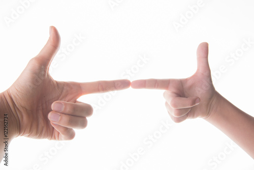 Hand of mom and son pointing finger to each other