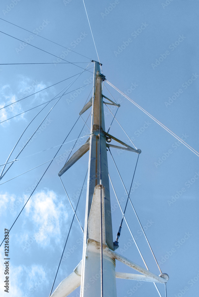 white yacht sails against the blue sky of tropical white yacht sails against the blue sky of tropical