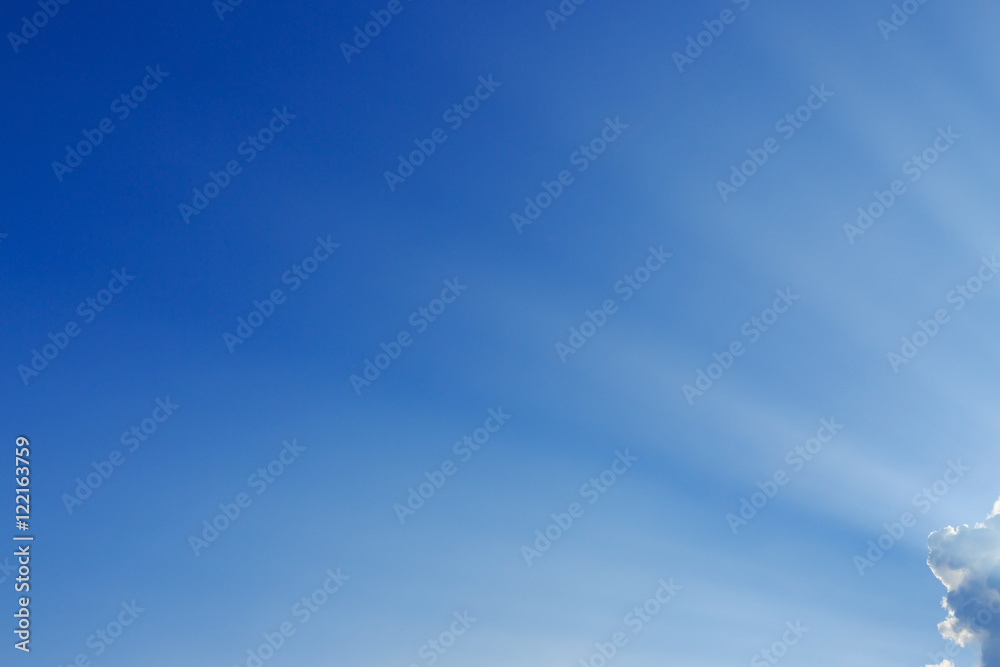 Fototapeta premium light rays on clear blue sky background