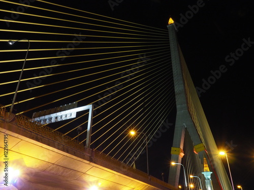 lighting form the bridge at riverside from thailand photo
