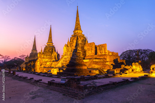 Asian religious architecture. Ancient pagoda at Wat Phra Sri Sanphet temple under twilight sky. Ayutthaya, Thailand