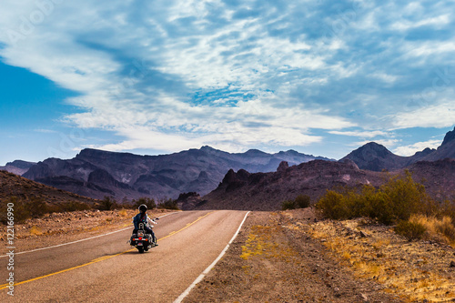 Biker driving on the Highway on legendary Route 66 to Oatman, Arizona.