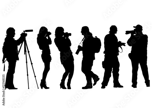 Man with a camera on white background